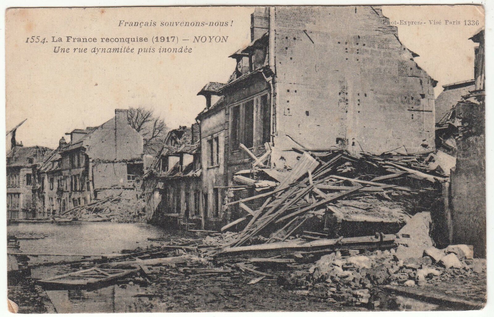 CARTE POSTALE NOYON UNE RUE DYNAMITEE PUIS RECONQUISE 123979985443